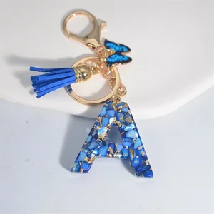 Chaveiro de pedra vitrificada azul para mulheres, letra de A a Z, 26 iniciais, alfabeto, borboleta, pingente borla, chaveiro do carro, presentes de joalheria, moda 8 principais vendas chaveiro de franja - №4