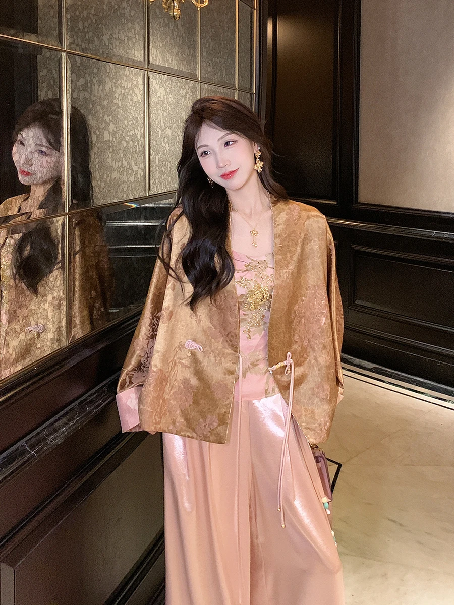 

Новый китайский тонкий повседневный комплект женской одежды: топ на бретельках и свободный жилет с V-образным вырезом на пуговицах для осеннего образа