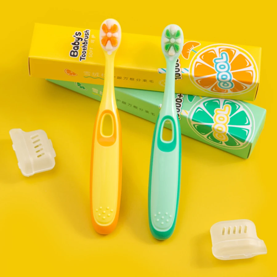 Children 3-12 years old ten thousand hair soft bristle toothbrush three colors available. Brush head with dust jacket