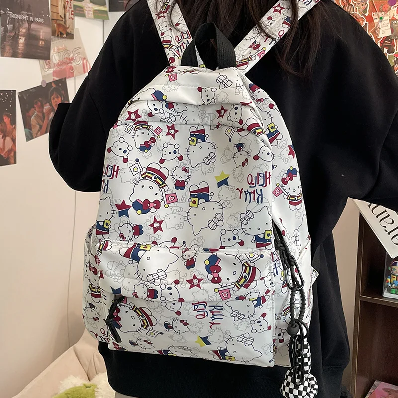 

Cute Sanrio Student Campus Backpack Anime Hello Kitty Graffiti Nylon Large Capacity Cartoon Backpack Comfortable and Durable