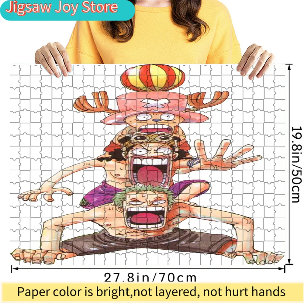

Premium Paper Jigsaw Puzzle Featuring One Piece Straw Hat Crew Funny Human Pyramid Artwork with Zoro, Usopp, Chopper and a Beach