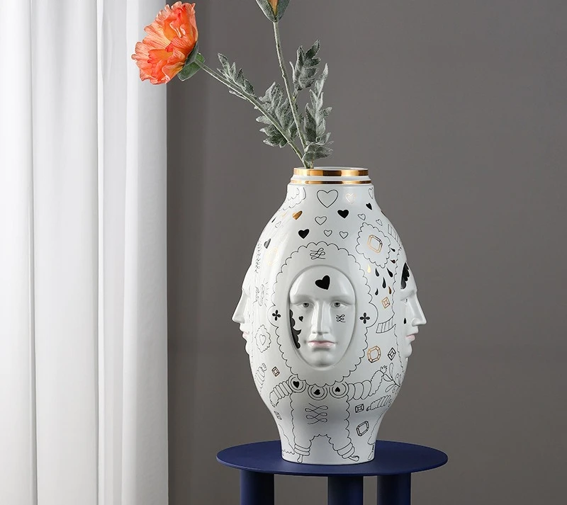 Painted face relief ceramic vase ornament, soft pottery pot flower ornament