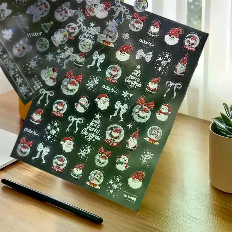 Seasonal Nail Decor with White Snowman and Crystal Snowball Motifs