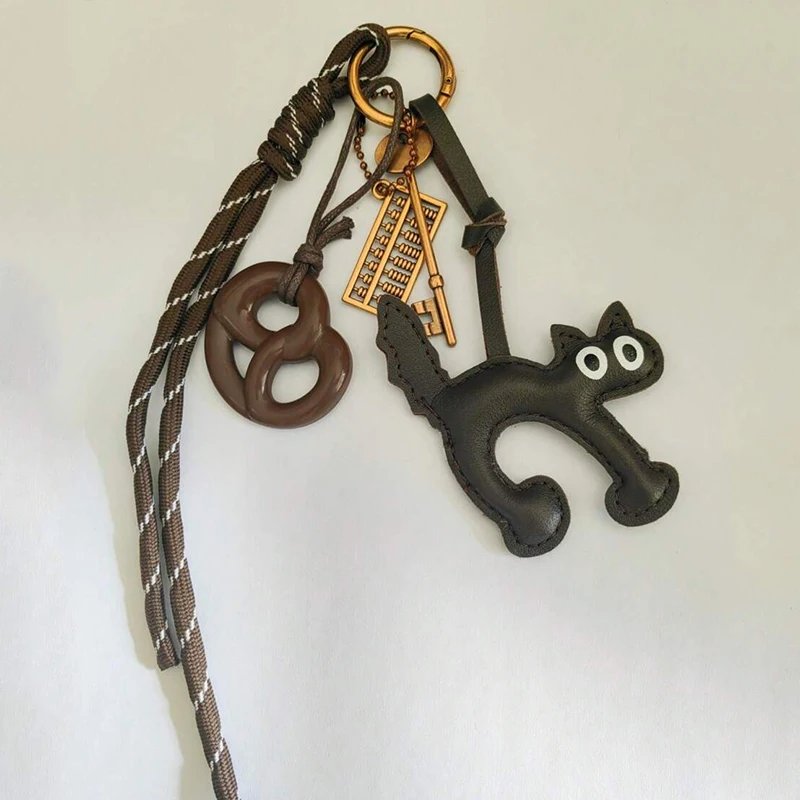 الكلاسيكية لطيف بو الجلود القط شكل المفاتيح قلادة جميلة سيارة حلقة رئيسية حقيبة سحر الهاتف قلادة حلية حلقة رئيسية الملحقات