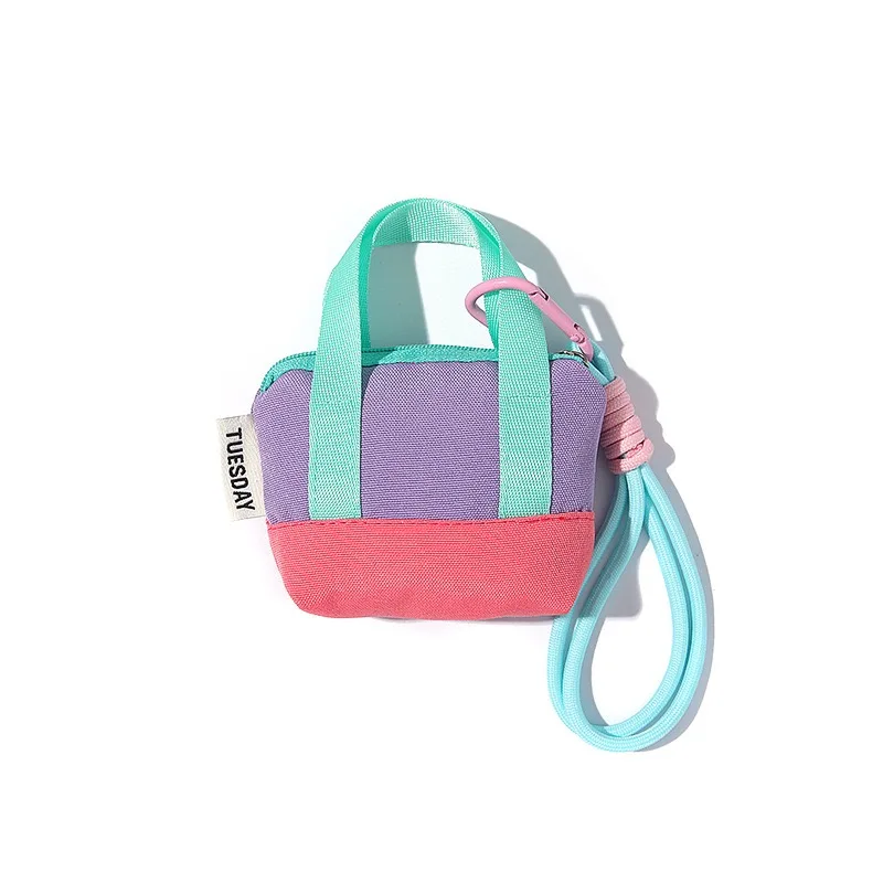 Neue Herbstkollektion: Canvas-Kopfhörertasche, Farbblock-Rucksackanhänger, Koreanischer Mode-Münzbeutel