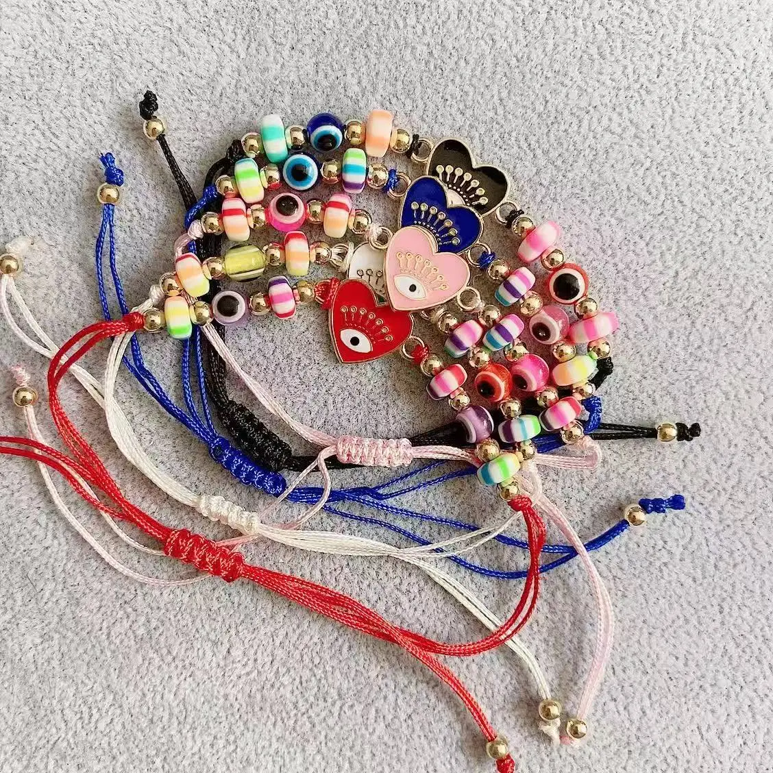 مجموعة مكونة من 12 قطعة من سوار مطرز من راتينج عين الشيطان على شكل قلب يقطر الزيت، سوار الصداقة القديم للرجال والنساء
