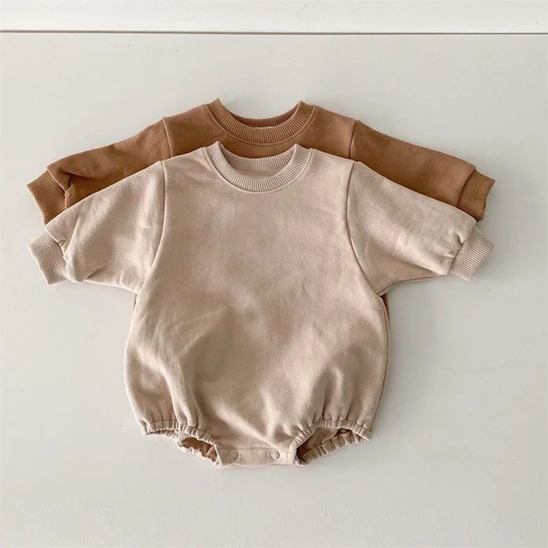 

The new Korean spring collection infantstoddlers featuressimple, loose, casualstylish triangularcrawling suit bothboysgirls