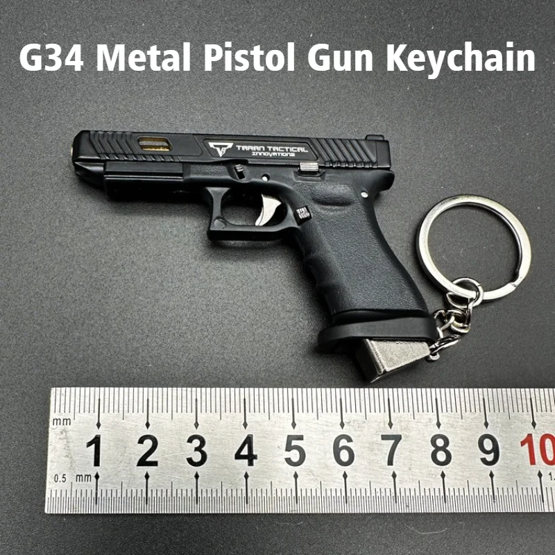 

1:3 Removable G34 Alloy Nylon Pistol Keychain Toy Hand Grab Model with Shell Throw Craft Figurines Miniatures for Decoration