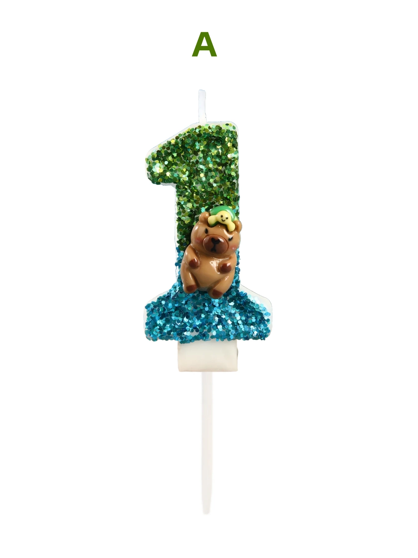 Green and blue cardboard capibara-shaped birthday candles with turtle decorations, as well as holiday and commemorative candles