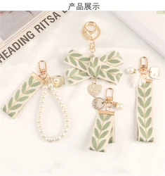 Fashion Leaf Shaped Braided Strap Keychain Pearl Heart Bow Pendant Key Chains Women Bag Charms Ornaments Car Keyring Accessories