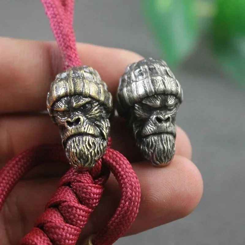 

Woolen Hat Gorilla Head Sculpture Brass Knife Beads Animal Orangutan EDC DIY Woven Paracord Lanyard Charms Pendants Accessories