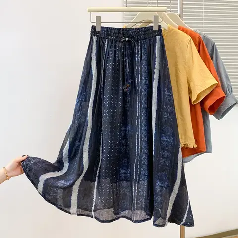กระโปรงผ้าฝ้ายลินินย้อมสีแบบหลวม ความยาวปานกลาง สีน้ำเงินเข้ม เอวสูง อเนกประสงค์ สำหรับฤดูใบไม้ผลิและฤดูร้อน ทรงเข้ารูป สไตล์ชาติพันธุ์