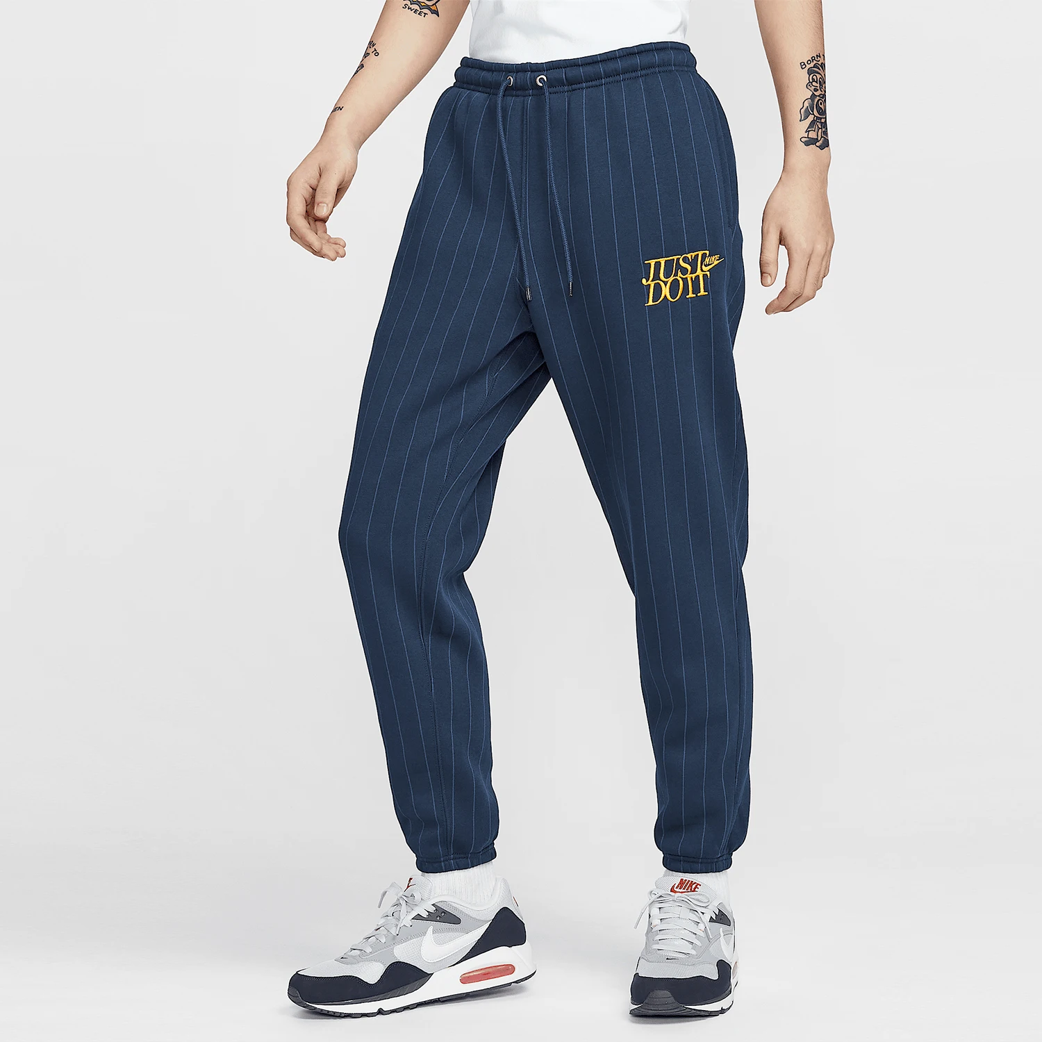 

Официальные новые мужские теплые брюки Nike на осень-зиму с вышивкой в вертикальную полоску HJ2215-451