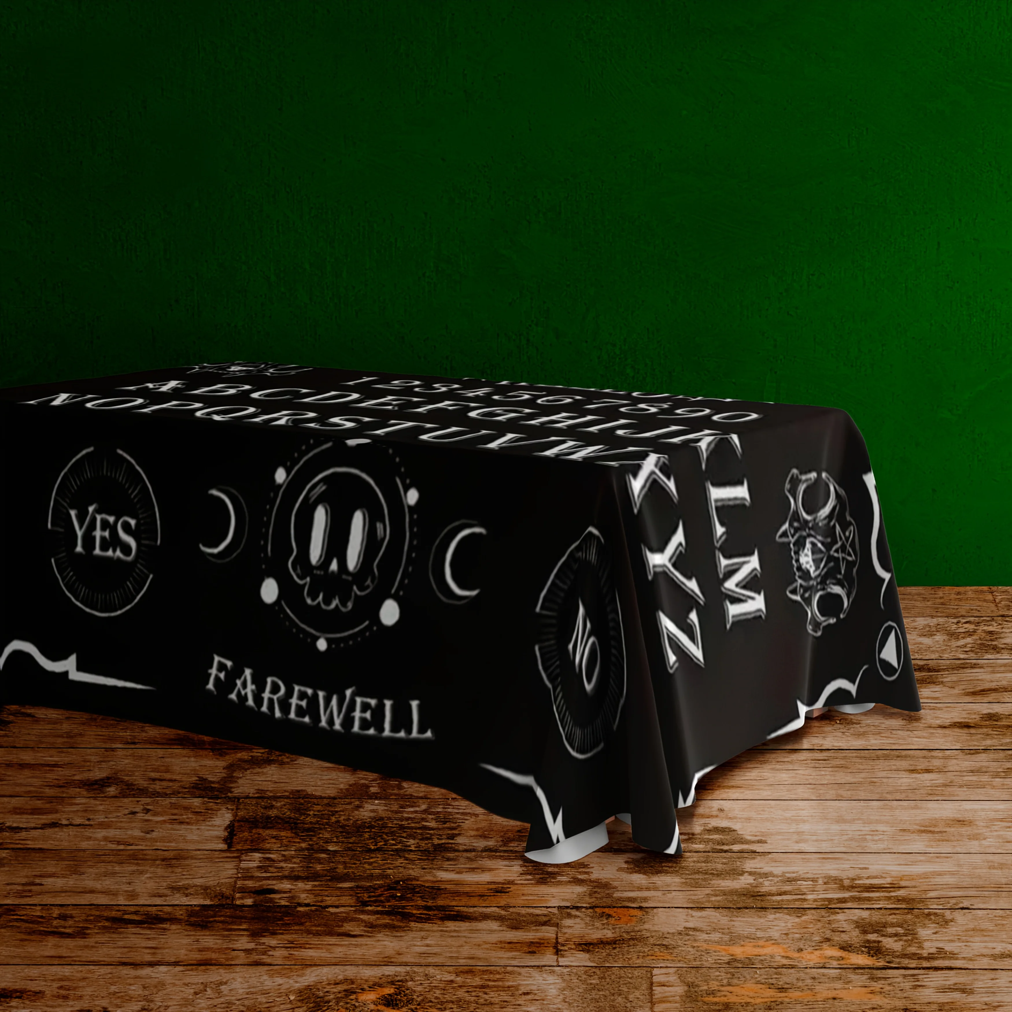 A Halloween or Dia de los Muertos party tablecloth with an aura board print. The party decoration is quite interesting.
