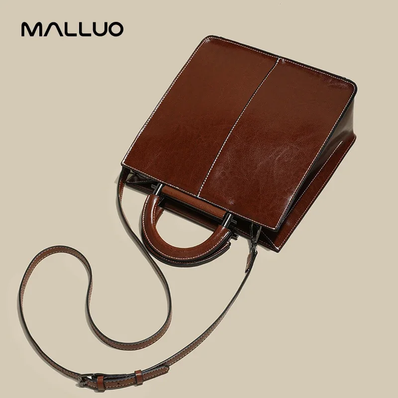 Bolso de mano de cuero genuino para mujer, nuevo estilo extranjero, bolsos de hombro de gran capacidad para ocio, bolsos cruzados de diseñador de lujo, bolso de mano