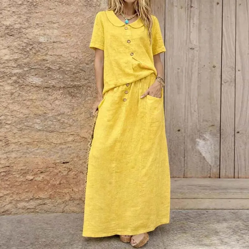 

Women's two-piece short-sleeved doll collar top loose pocket skirt 2026 new casual button cotton and linen solid color suit