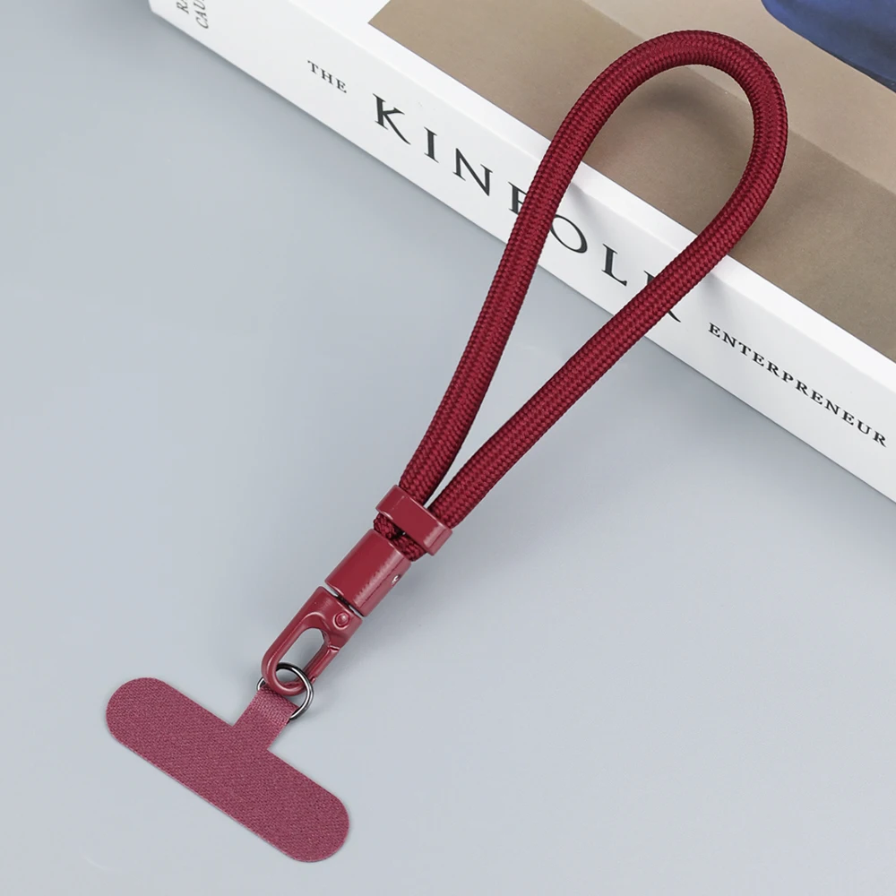 Universele verstelbare mobiele telefoonkoord, korte polsband met zelfsluitend anti-drop ontwerp, duurzame polyester telefoonriem