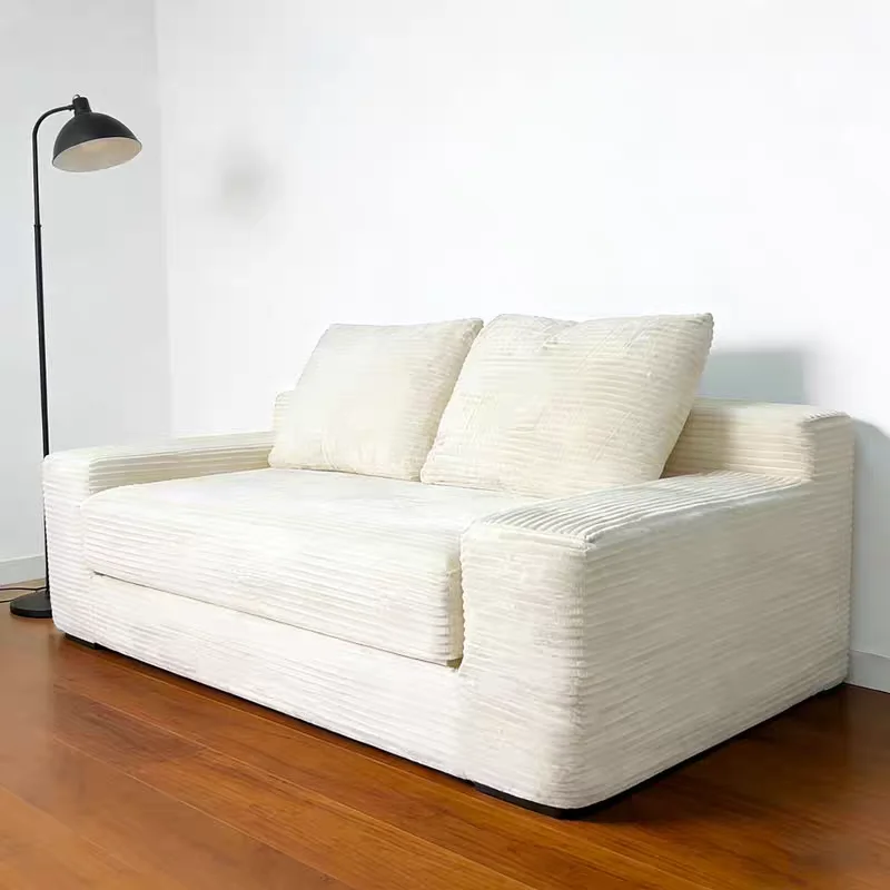 A reclining sofa bed with a combination of vacuum compression fabrics, modern design, suitable for living rooms