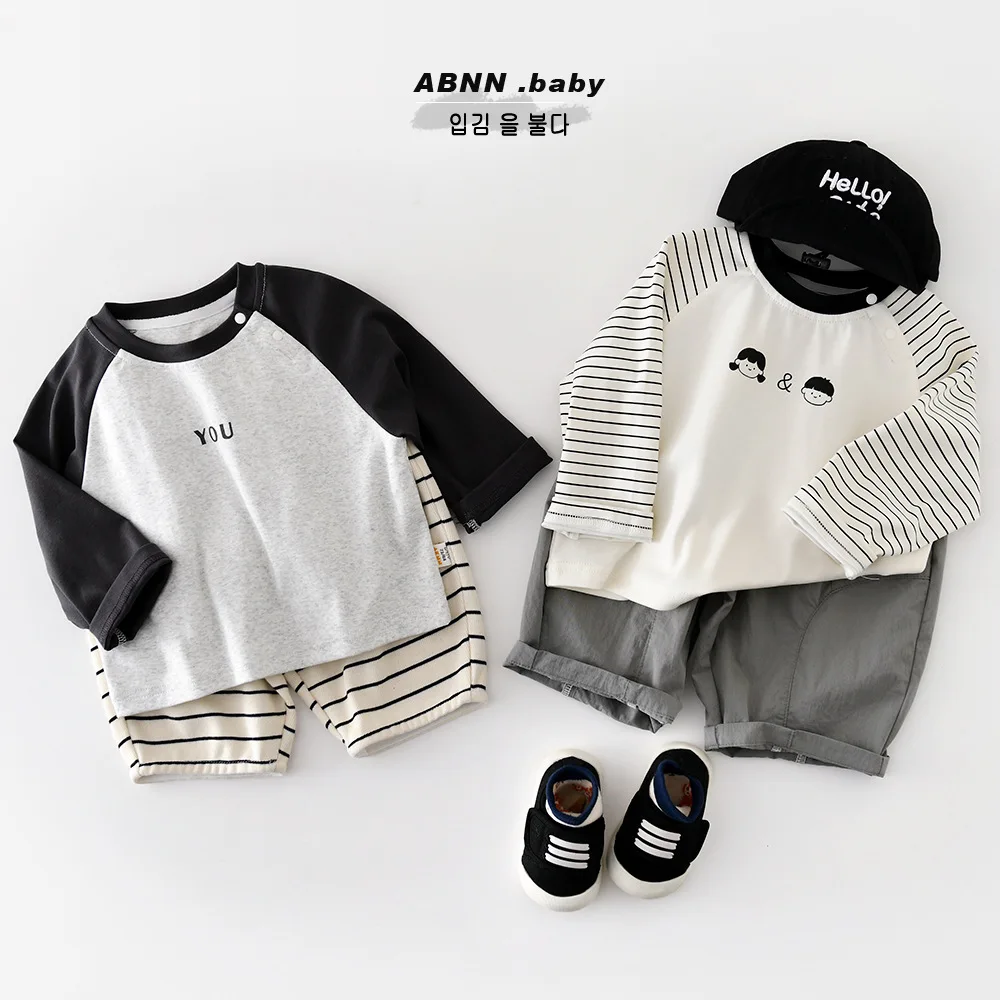 2026 ربيع جديد طفل طويل الأكمام تي شيرت القطن الرضع الفتيان عادية مخطط تي شيرت الفتيات طباعة قاع القمصان طفل الملابس