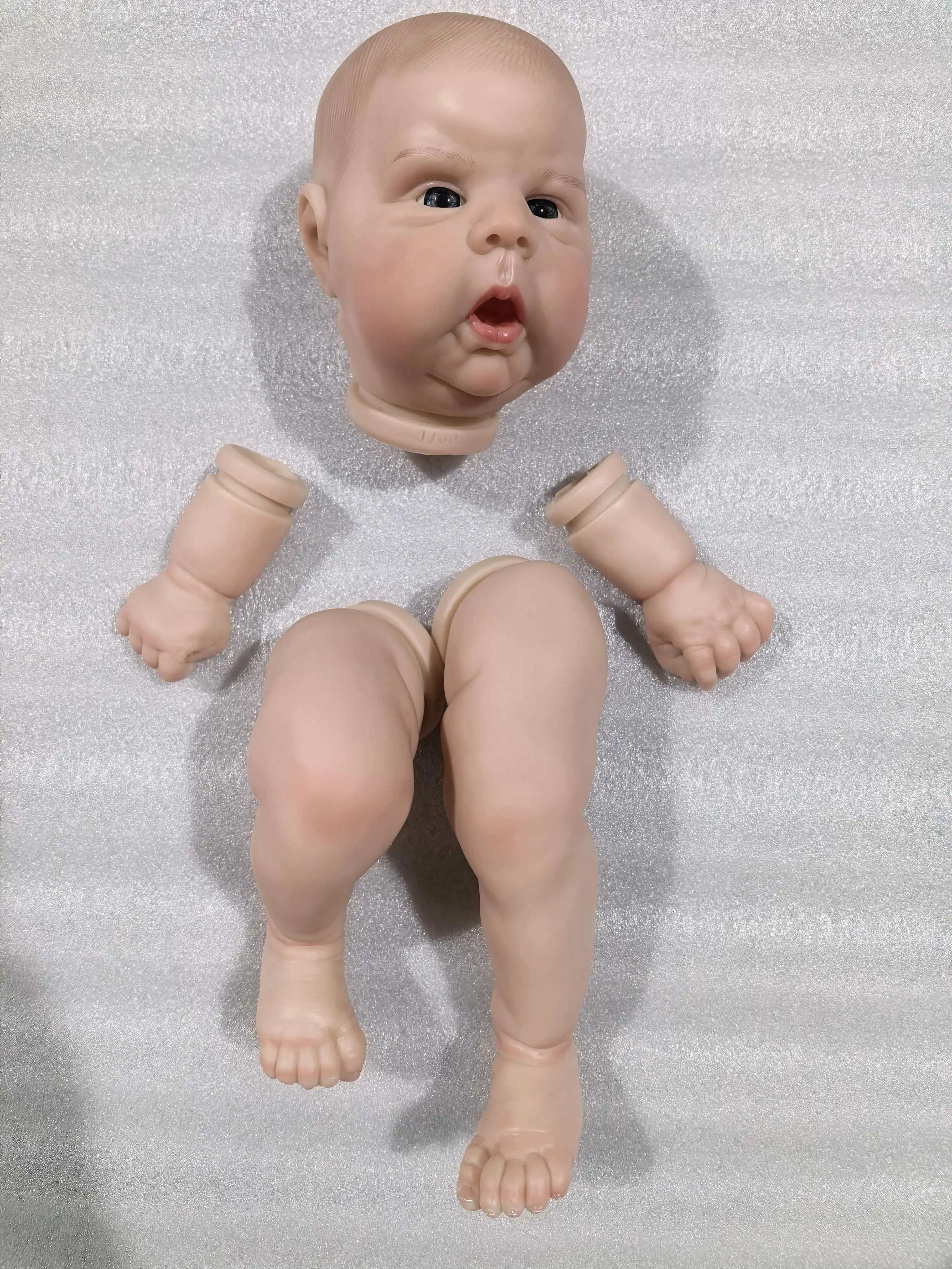 

NPK 22inch Gounchi Reborn Doll Kits with White Skin Painted Hair And Cloth Body Finished Doll Kit for Collectors