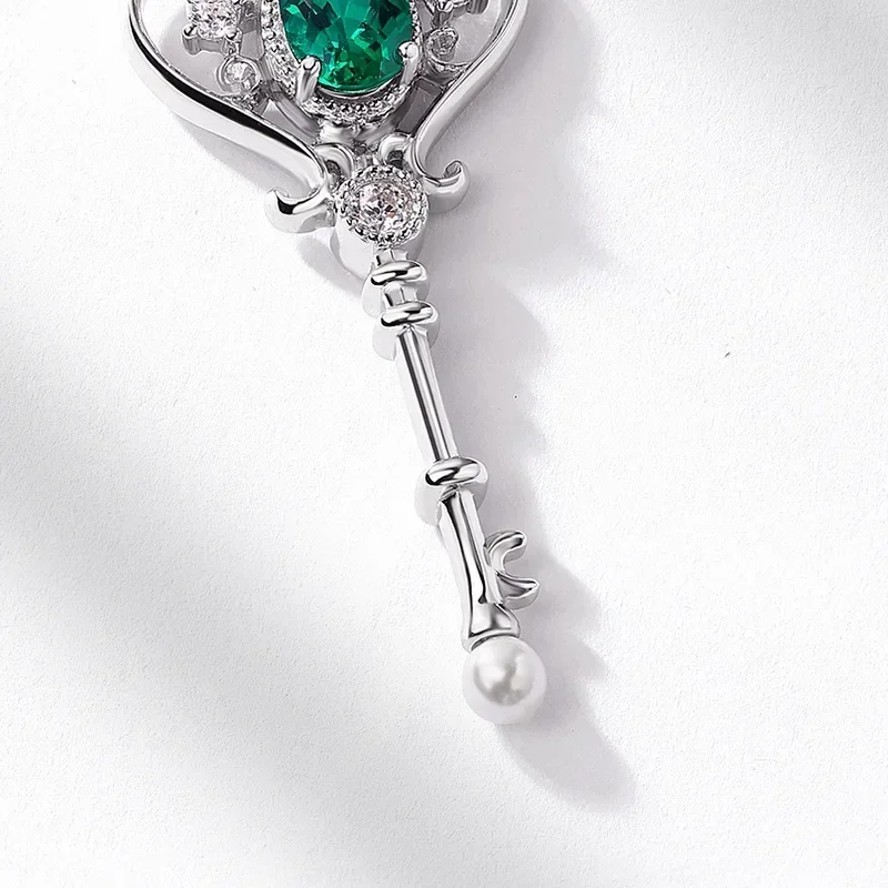 S925 الفضة مطلي 18K الذهب PT950 البلاتين الأوريول الذيل زهرة المرأة زراعة اليشم مفتاح قلادة