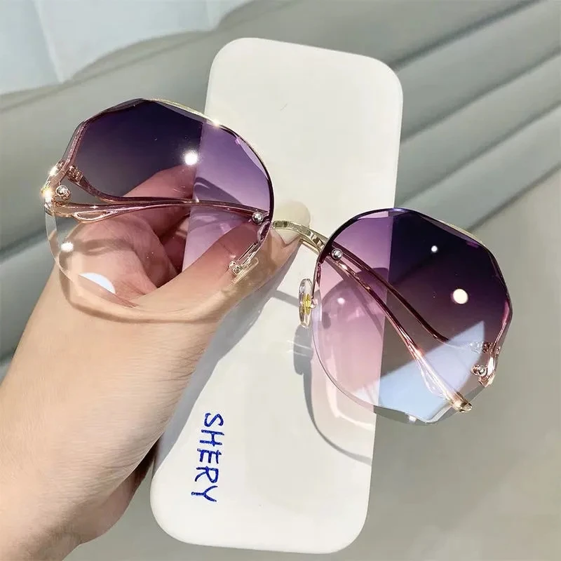 

Women Rimless Sunglasses Fashion Gradient Ocean Sun Glasses Female Retro Metal Curved Temples Anti Glare Driving Googles UV400