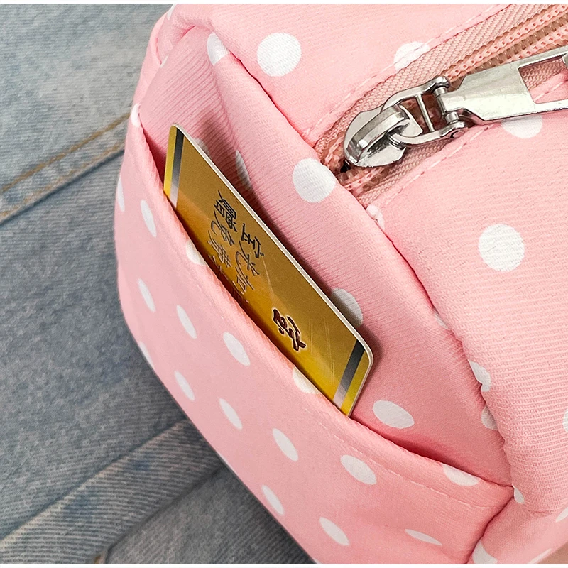 Gepunktete Schultertasche in langem Zylinderformat, Damen-Handtasche mit Tragegriff, zylindrische, leichte, schicke Tragetasche für den Arbeitsweg – Detail 4
