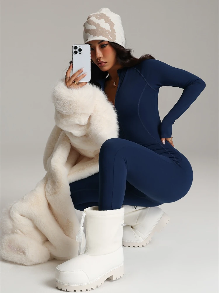 بدلة تزلج نسائية للخريف والشتاء مبطنة بالصوف مع سحاب وأكمام طويلة لليوجا واللياقة البدنية قطعة واحدة بدلة رياضية للجري في صالة الألعاب الرياضية