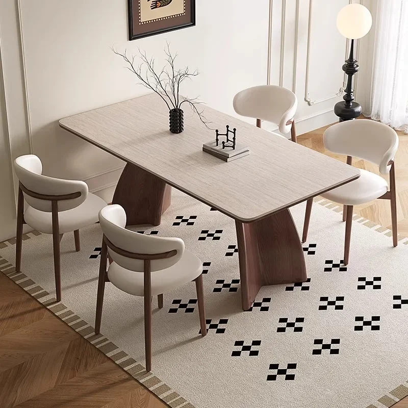 

Solid wood rock slab dining table Modern simple walnut home French retro small apartment rectangular dining table