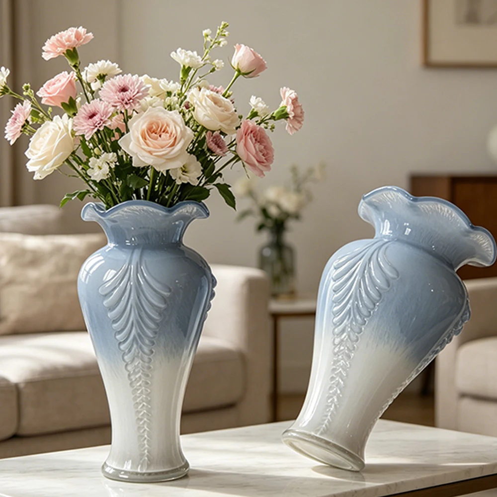 Handmade beautiful shoulder-shaped glass vase with wavy edges, with embossed floral motifs on the main body of the vase