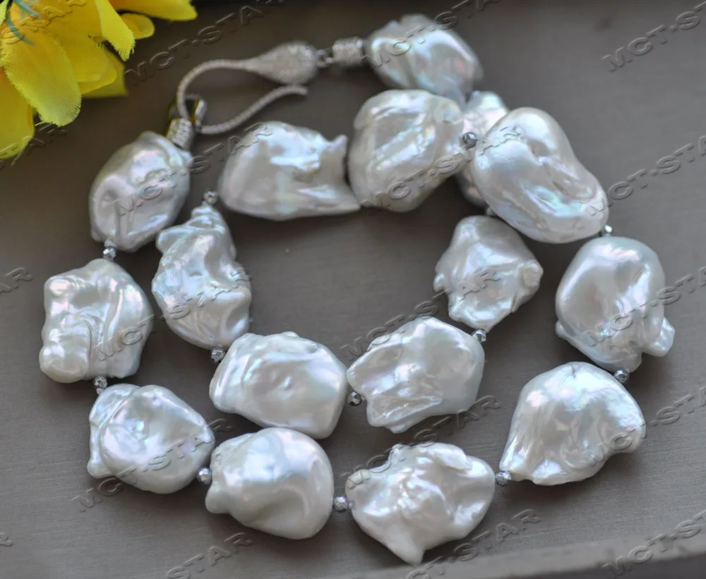 

Z12528 19" 27MM WHITE BAROQUE KESHI PEARL NECKLACE CZ