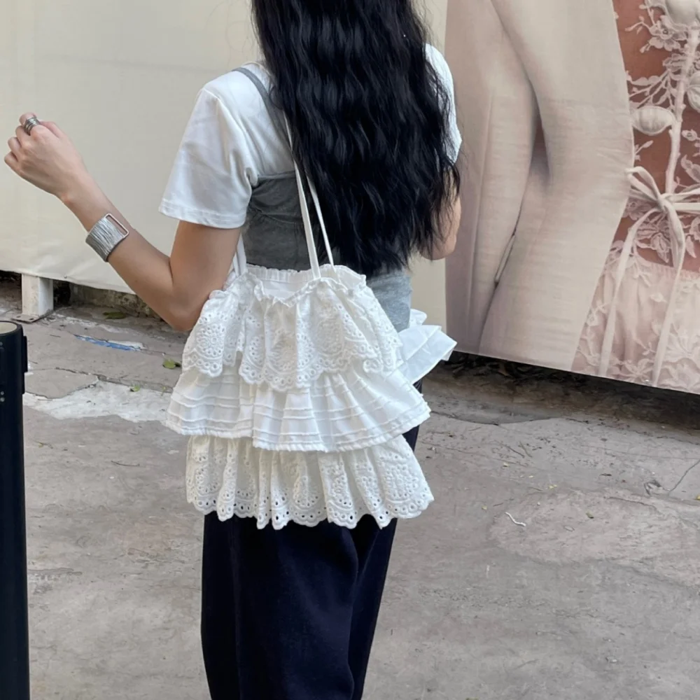 Simple and versatile lace and lace ruffle skirt shape organizer bag