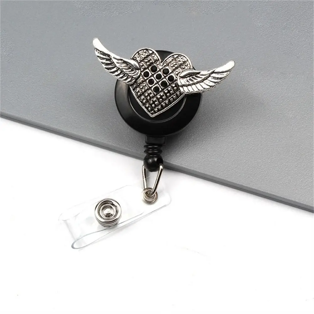 Держатель в виде крыльев сердца