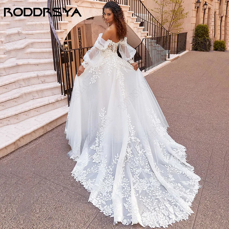 RODDRSYA Vestidos De Casamento De Praia Lace Puff Mangas Vestidos De Noiva Princesa Fora Do Ombro Vestido De Novia Apliques Tulle Sweep Train Praia Vestidos de casamento Lace Puff Mangas Vestidos de noiva Princesa Off