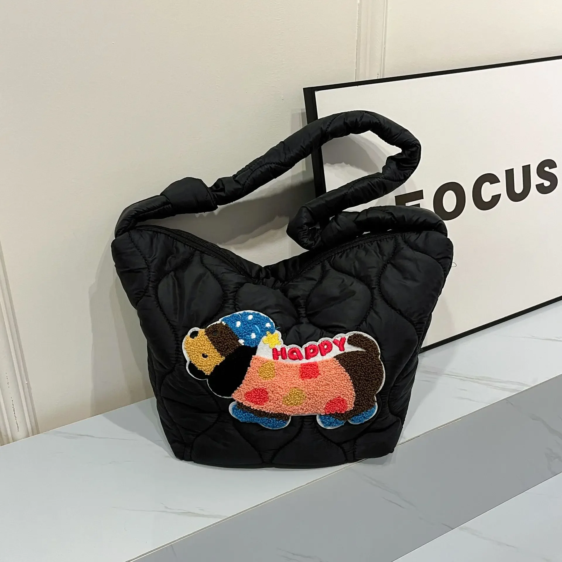 

Women's bag autumn and winter new cloud fold bubble cotton cute puppy cartoon bag hand bill shoulder bag cute handbag