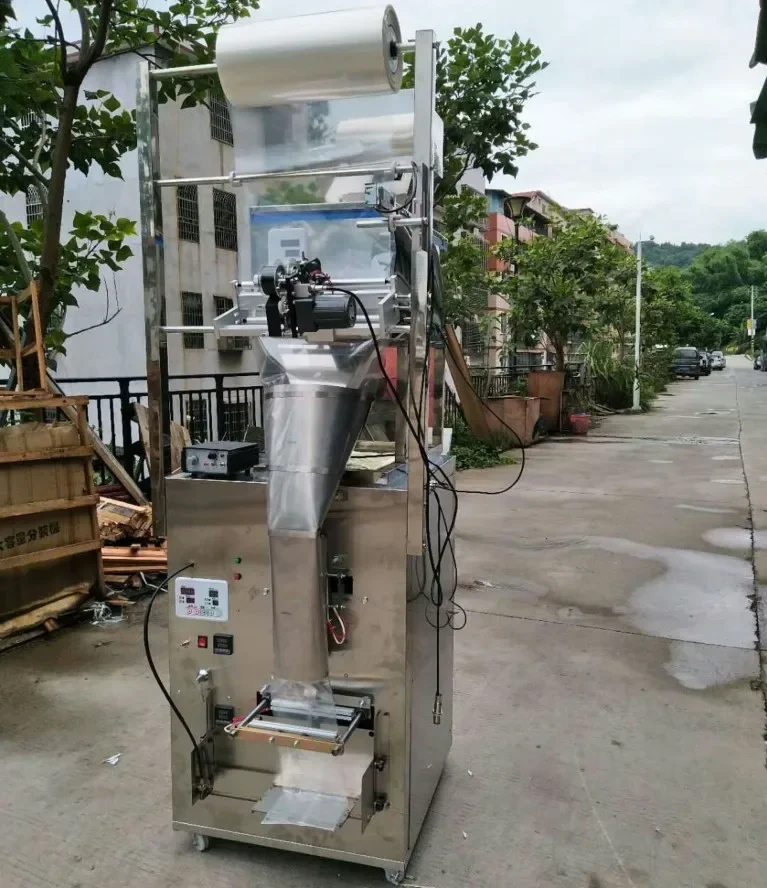 

Машина для упаковки фисташковых пакетов с задним уплотнением с большим диапазоном упаковки 30-1000 г с принтером даты и курсором