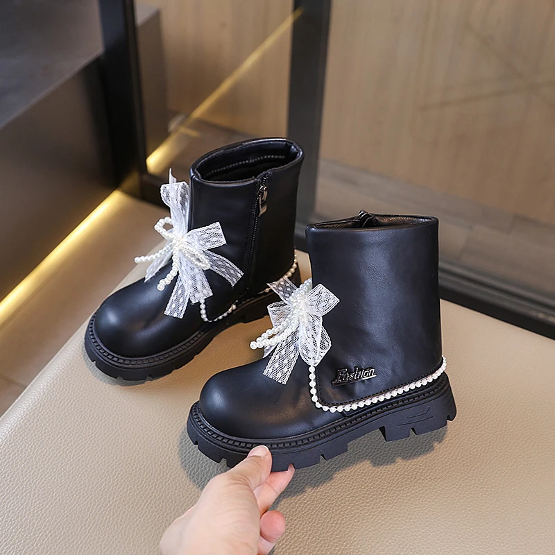 2025 nouvelles filles bottes doublées en peluche mode arcs perles conception enfants chaussures d'hiver haut antidérapant luxe enfants botte en cuir