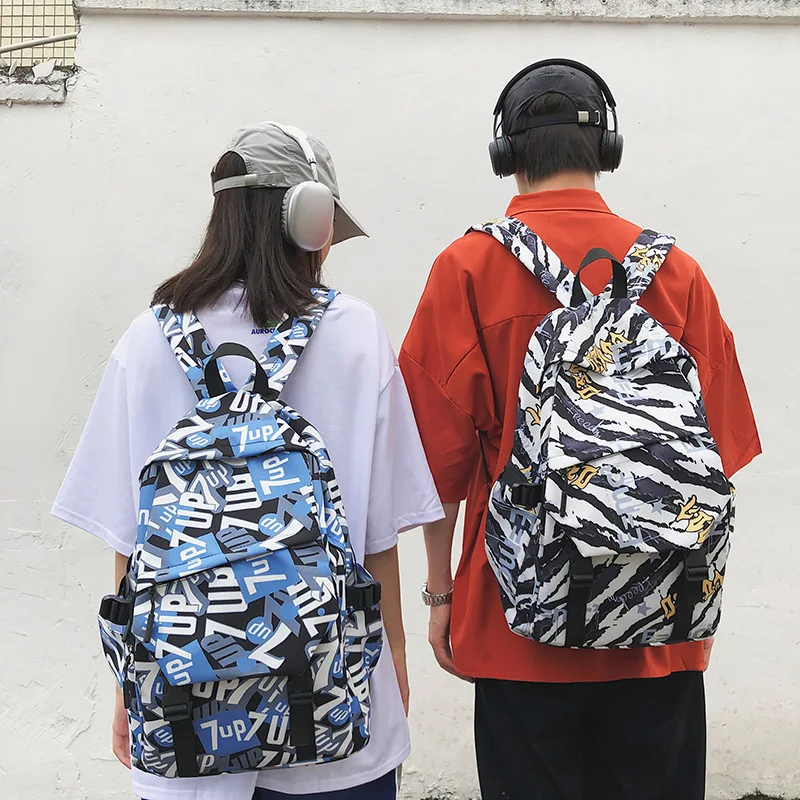 

2025 New Graffiti Comic Shool Bag High-Value Stylish Versatile Couple Shoulder Backpack Casual Large Capacity Travel Bags