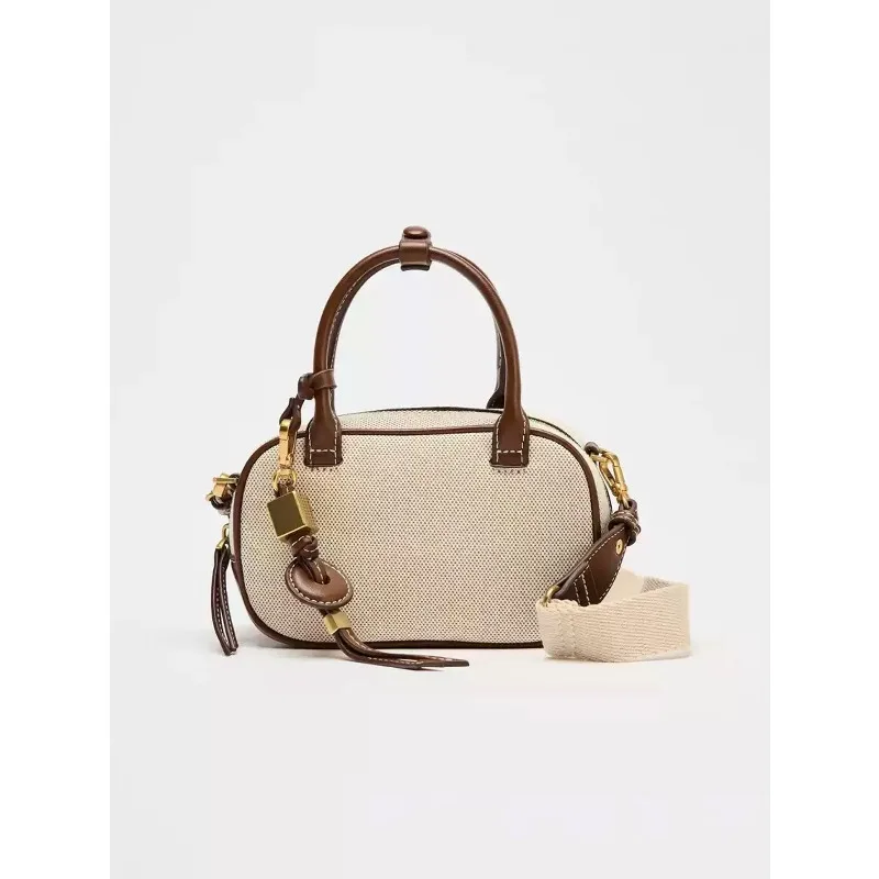 

New niche retro color-blocking hand-held small bag, stylish crossbody canvas PU small square bag, single-shoulder bowling b