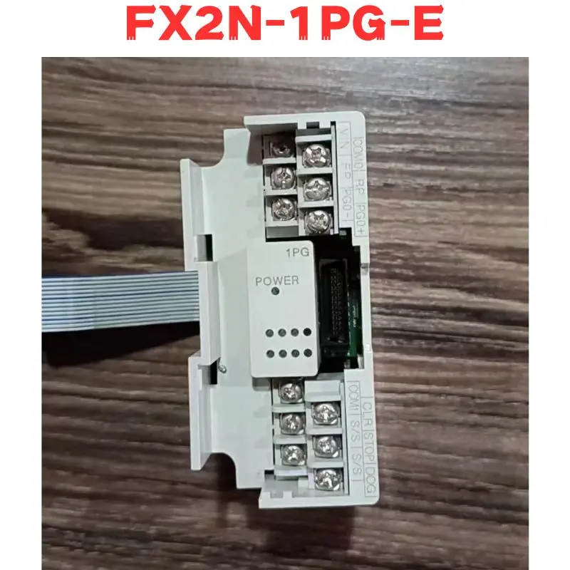 Second-hand FX2N-1PG-E FX2N 1PG E Module Tested OK