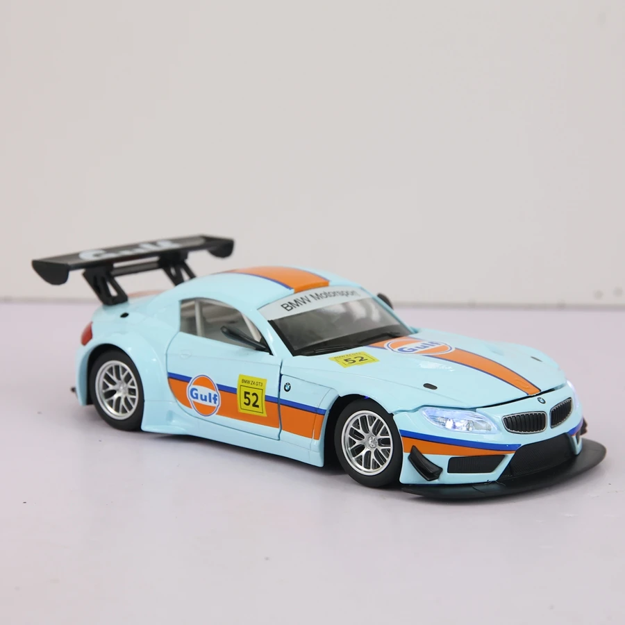 

Модель автомобиля CCA 1:24 BMW Z4 GT3 Gulf Oil Edition из сплава, с открывающимися дверями и капотом, с имитацией звука и световых эффектов.