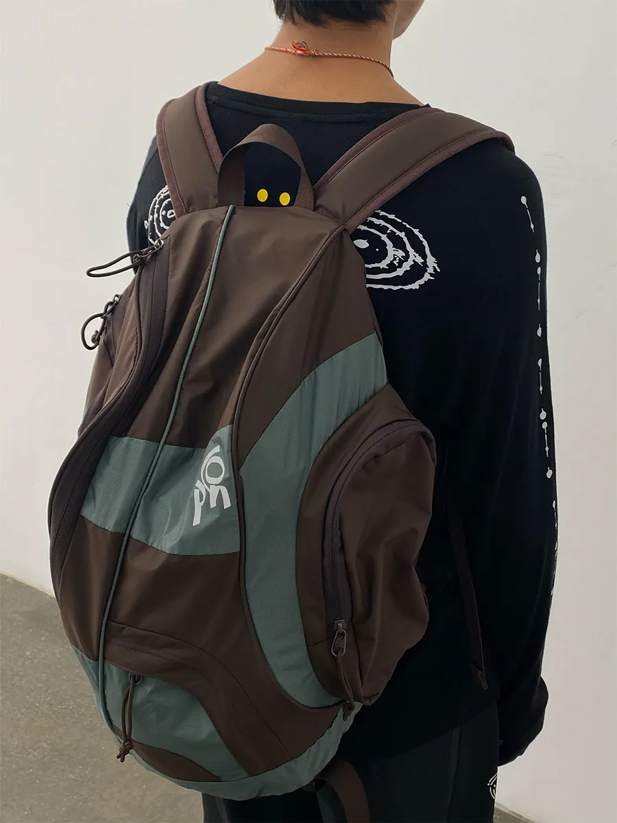 

2026 Fashion New Type Personalized Shell shaped Appearance Design Waterproof Nylon Cloth Large Capacity Outdoor Travel Backpacks