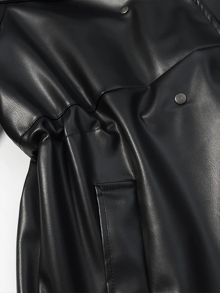 เสื้อโค้ทหนังทรงยุโรปแบบใหม่สำหรับผู้หญิง ดีไซน์ทันสมัยและใช้งานได้หลากหลาย คอตั้ง ผูกเชือกเอว ความยาวปานกลาง