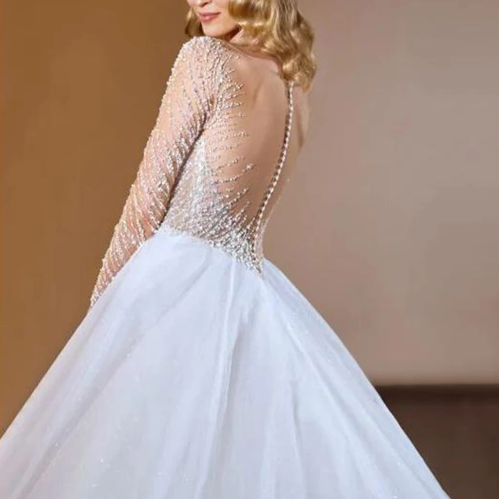 カスタムメイドのビーズ装飾が施されたウェディングドレス、ロングスリーブ、キラキラ輝くチュールのボールガウン、花嫁用、ボタンバック、ローブ・ド・マリアージュ