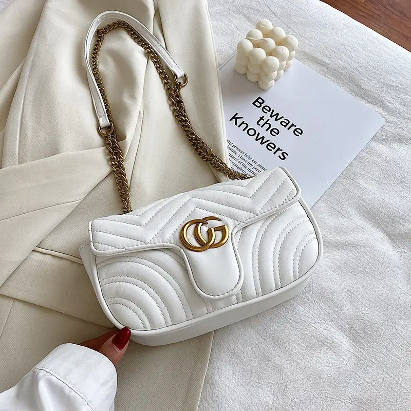 حقيبة كتف احترافية أنيقة للنساء أثناء السفر مع مادة من جلد الغزال ومقصورات متعددة وسطح ناعم ومريح