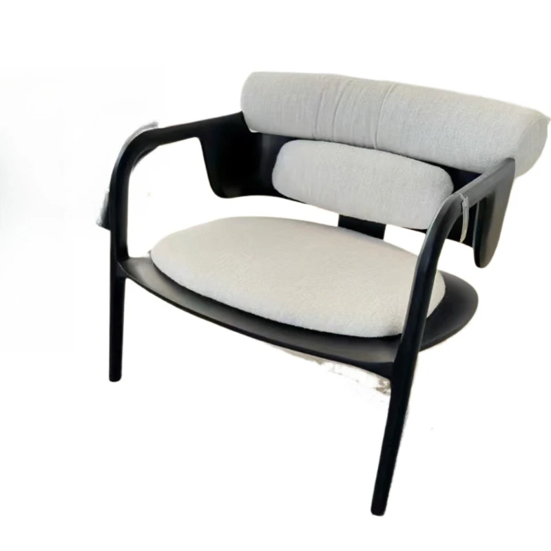 

Modern minimalist black and white single sofa, curved armrest lamb wool lounge chair