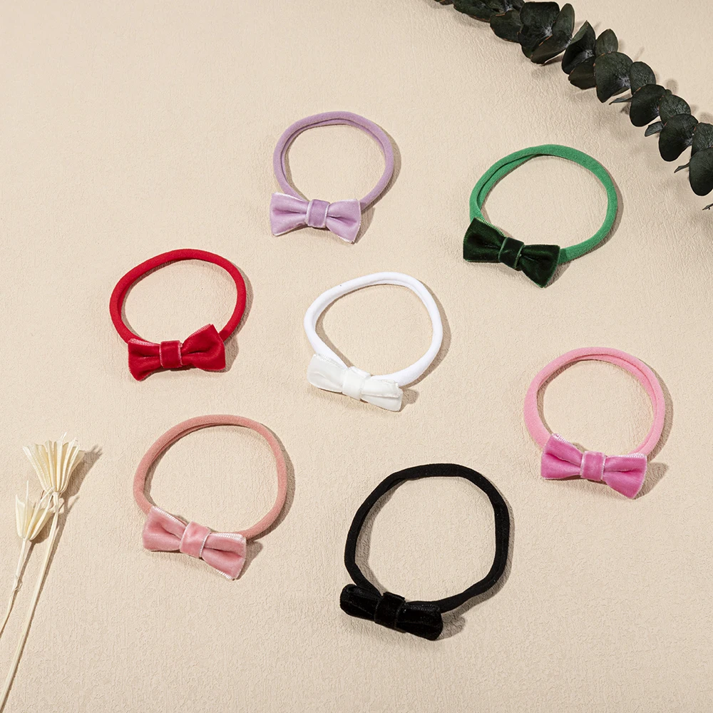 7 Teile/satz Nette Mini Nette Samt Bowknot Stirnband Baby Mädchen Weiche Elastische Haarband für Infant Stirnband Haar Zubehör