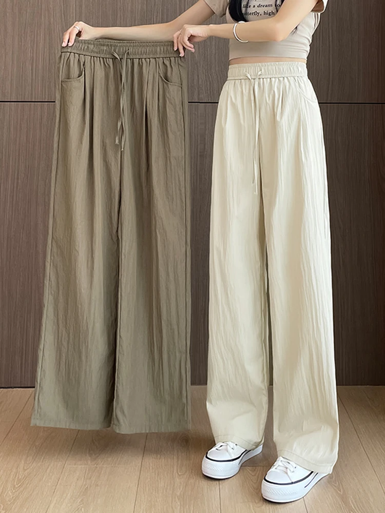 

Holiday Loose Texture Wrinkle Fabric Trouser Linen Feel Drawstring Waist Long Wide Leg Pants With Solid Color Knot Belt Design