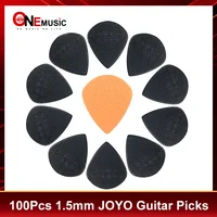 150 unidades/lote de púas de guitarra JOYO ""Never Give Up Dreams"" de 1,5 mm de grosor, color negro/naranja