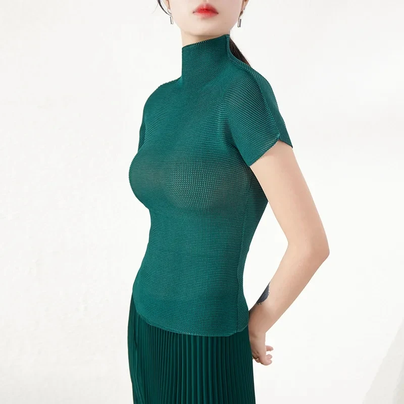 Nuevo Top plisado para mujer, camiseta de manga corta con cuello redondo ajustada elástica y elegante con temperamento para primavera y verano